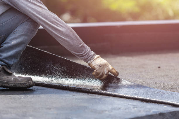 Professional Waterproofing technician working in Weaver, AL